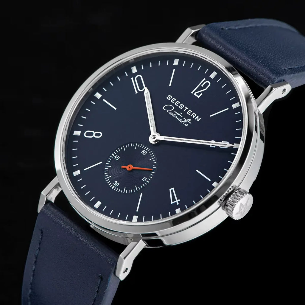 SEESTERN Automatic wristwatch with navy blue dial, silver case, and blue leather strap
